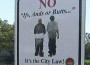 Signs in Opa-Locka, Florida warn residents about the saggy pants law.