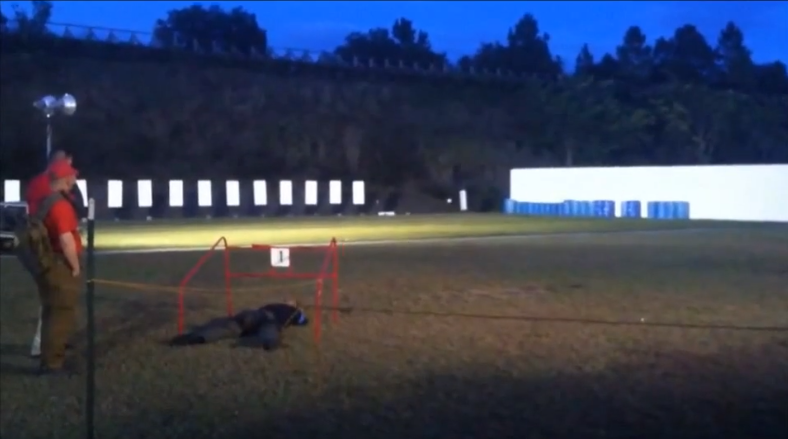 Corporal David Woolf makes a 50 yard shot with a pistol. 