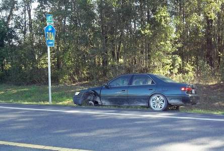 Wheel Breaks Free From Car; Kills One, Injures Another