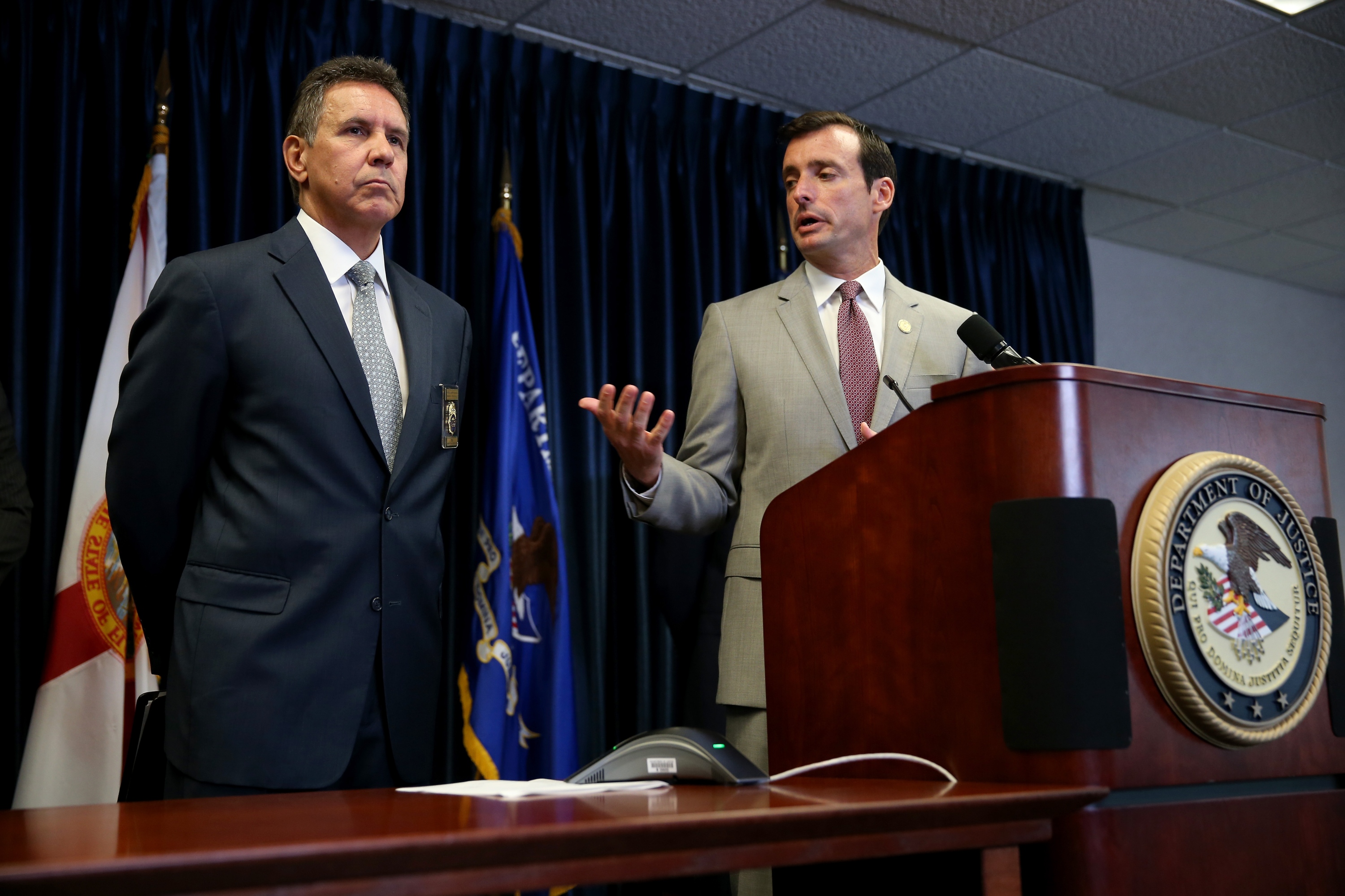 MIAMI, FL - AUGUST 05: Mark R. Trouville, Special Agent in Charge for DEA Miami, (L) and United States Attorney Wifredo A. Ferrer speak to the media about those arrested today in connection with the Major League Baseball steroid scandal on August 5, 2014 in Miami, Florida. Federal authorities say that ten people were arrested including Anthony Bosch, the former Biogenesis of America clinic owner, who was charged Tuesday with conspiracy to distribute steroids. (Photo by Joe Raedle/Getty Images)