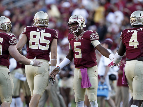TALLAHASSEE, FL - OCTOBER 4: Quarterback Jameis Winston #5 of the Florida State Seminoles on the sidelines during the game against the Wake Forest Demon Deacons at Doak Campbell Stadium on Bobby Bowden Field on October 4, 2014 in Tallahassee, Florida. The #1 ranked Florida State Seminoles defeated the Wake Forest Demon Deacons 43 to 3. (Photo by Don Juan Moore/Getty Images)