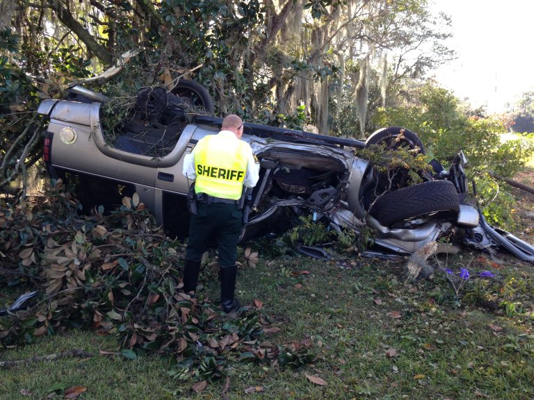 Woman crushed under SUV