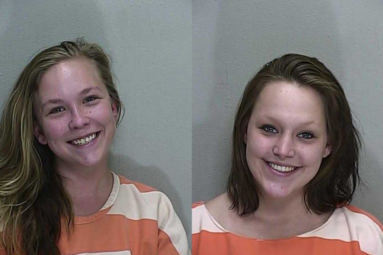 A case of the giggles: Two women laugh all the way to jail