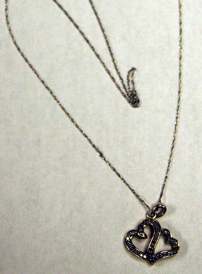 Body of young female found: Can you identify this necklace?