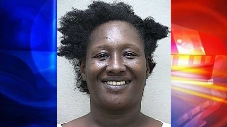 Woman arrested for hitting juveniles with a cooking pot