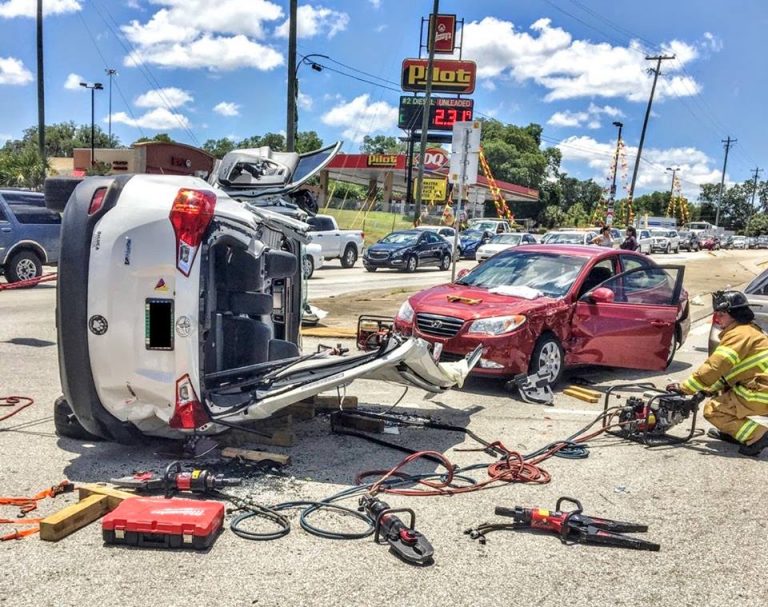 Two people cut from vehicle following 484 crash