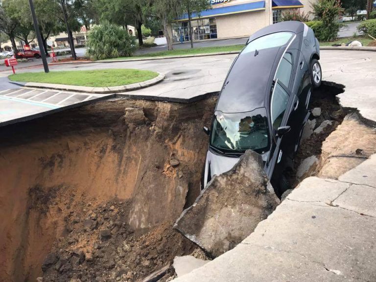 Sinkhole forms following heavy rainfall