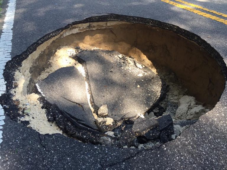 Sinkhole opens up on Highway 318