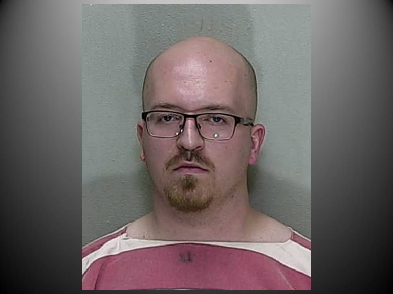 Man arrested, charged with possessing child pornography