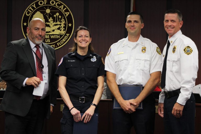 Ocala Fire Rescue presents life saving award  to two off duty first responders